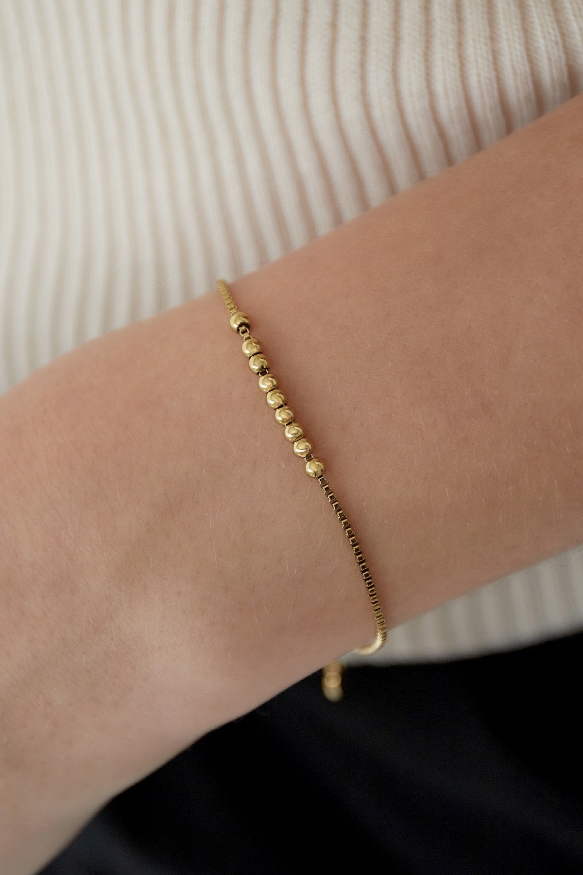 Armband met bolletjes goud -